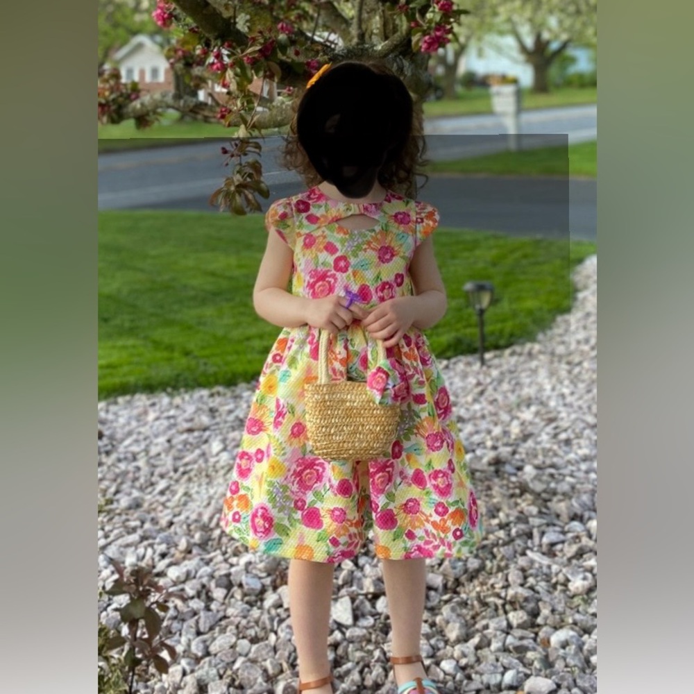 Floral dress and matching straw handbag